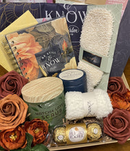 Cargar imagen en el visor de la galería, Gifting basket with flowers, candles, and chocolates on a wooden surface