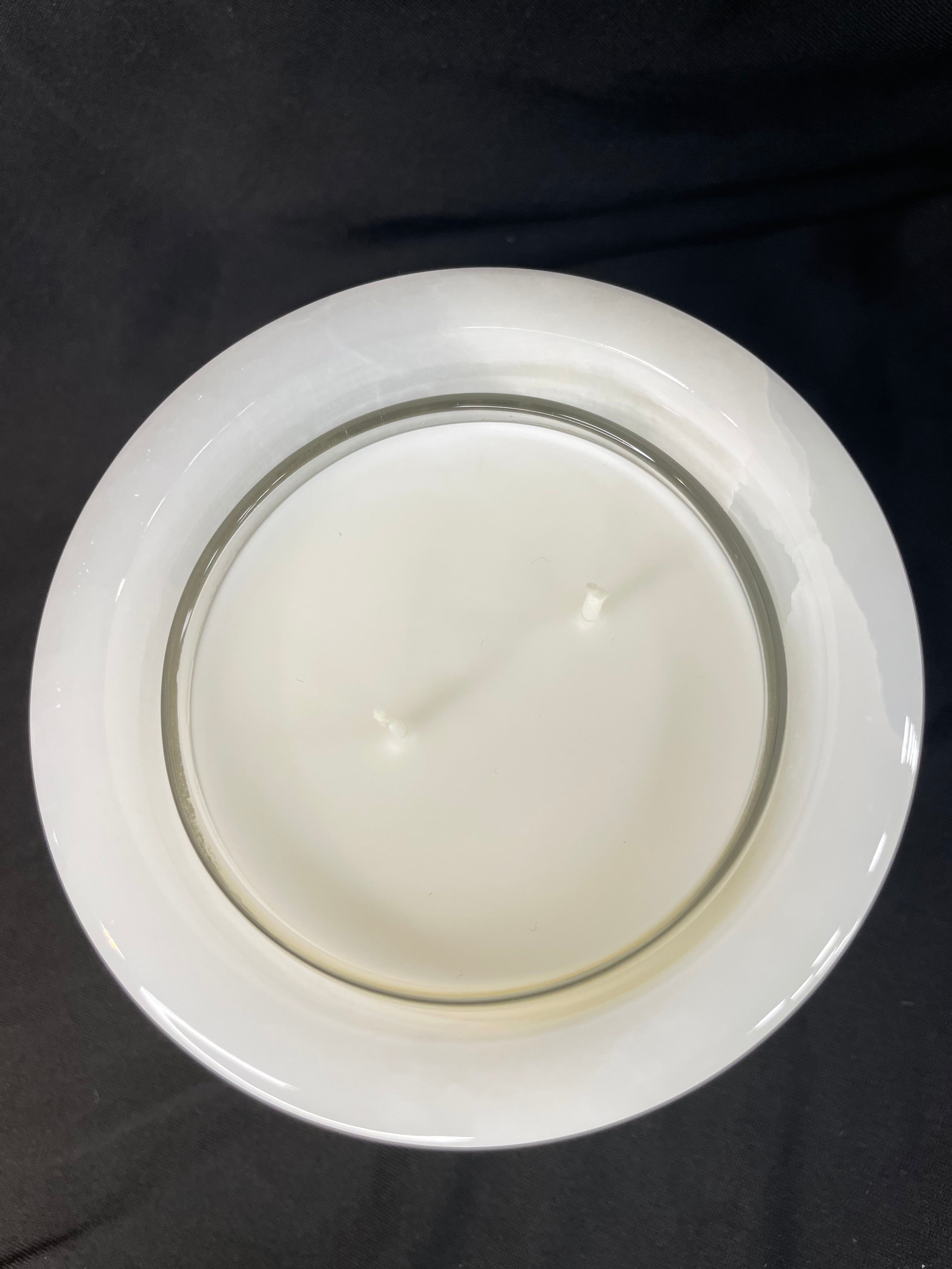 Top view of double-wick coconut wax candle in crystal-like onyx jar