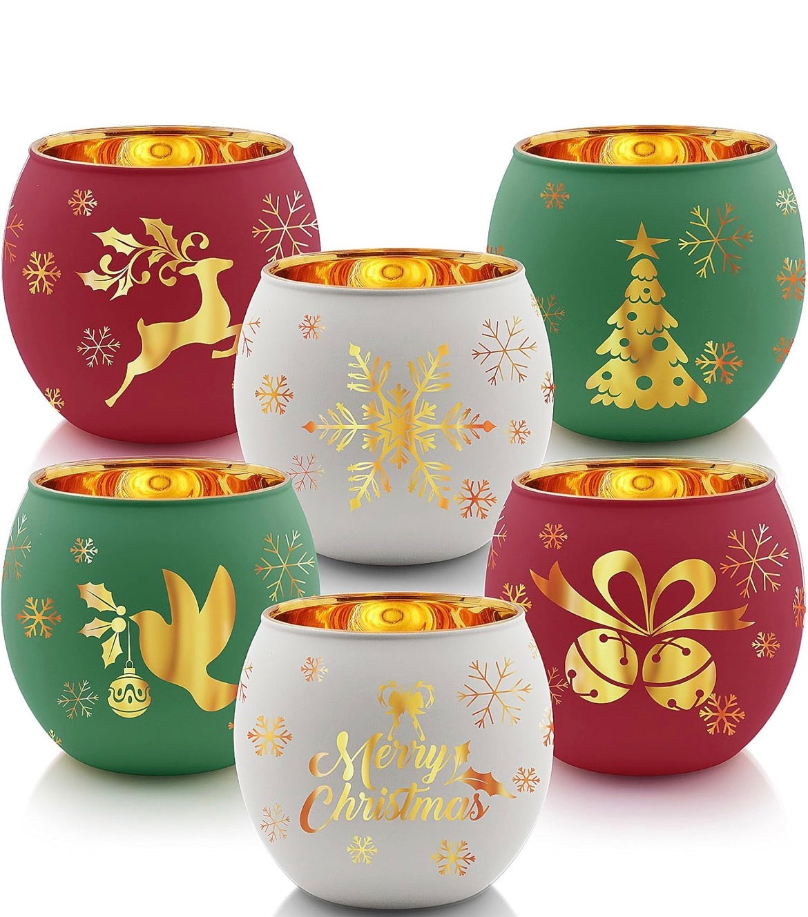 Frosted Christmas candle holders in red, green, and white with gold interior reflecting warm candlelight.