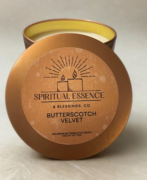 Butterscotch Velvet candle in copper tin with three cotton wicks, sweet bourbon butterscotch scent, surrounded by autumn leaves and decor.