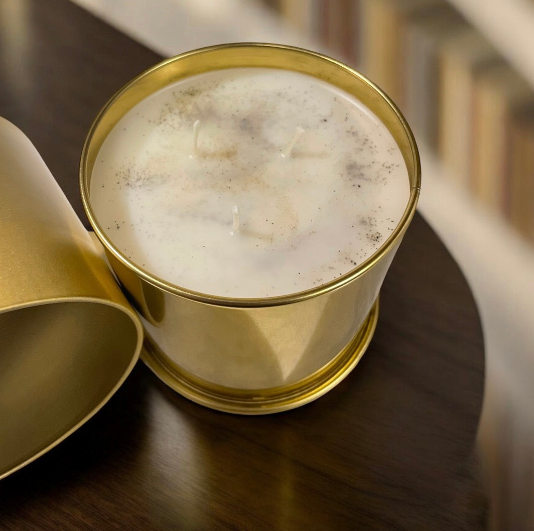 Luxury gold candle in metal tin with triple cotton wicks and golden shimmer top. Hand-poured Christmas Splendor scent by Spiritual Essence & Blessings Co.