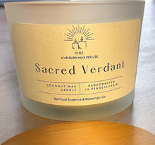 Load image into Gallery viewer, Sacred Verdant candle with bamboo lid, shown in frosted glass jar with clear label and three cotton wicks.”
