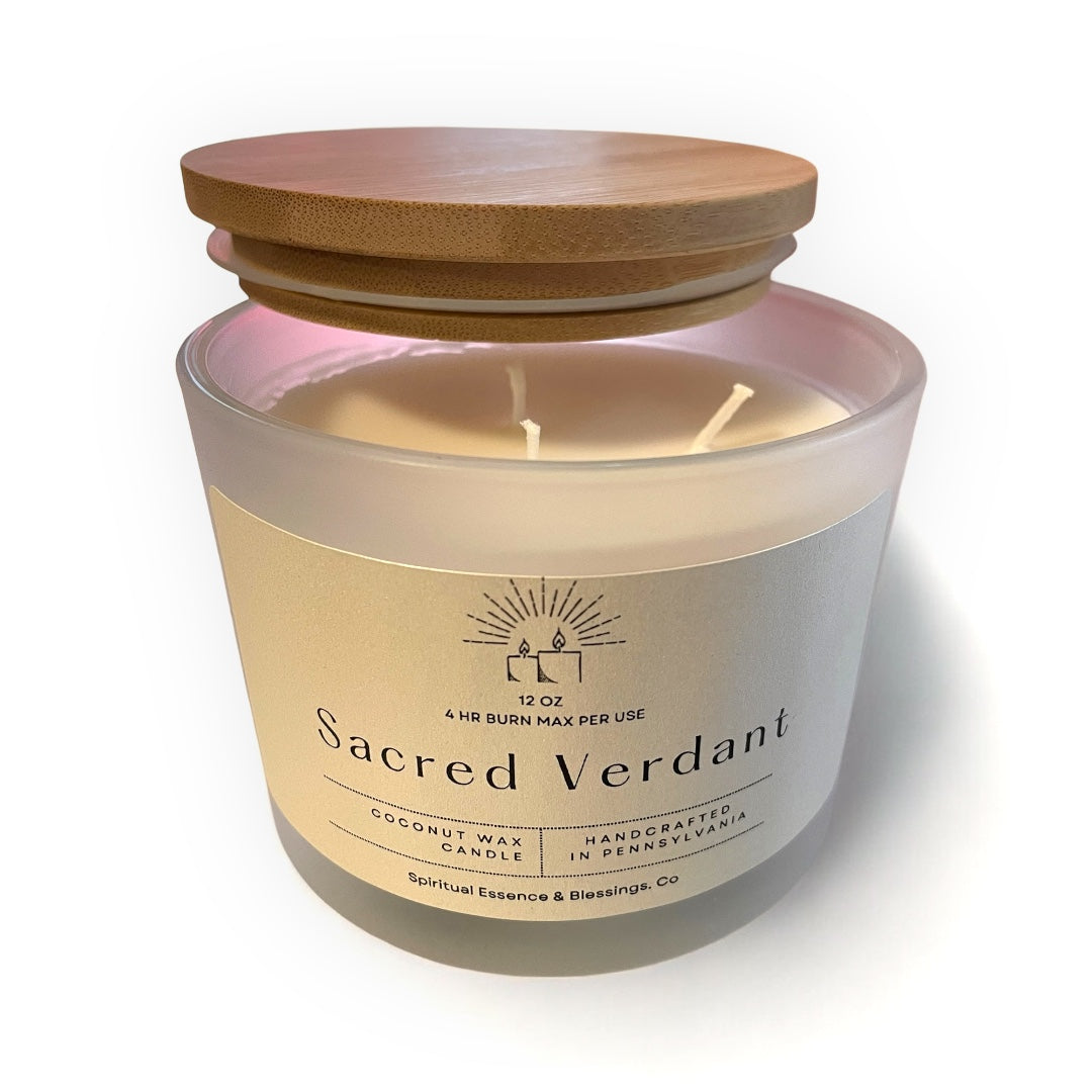 Frosted glass candle with Sacred Verdant label and bamboo lid, angled view showing full product design.”